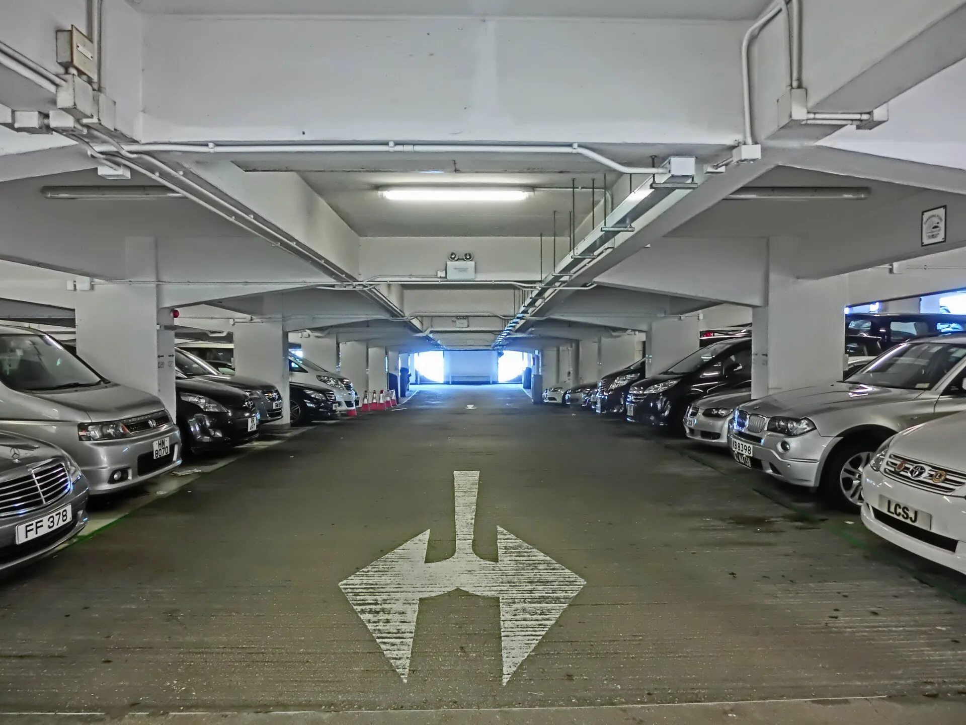 Existing parking deck recorded for slab, headroom and access conditions